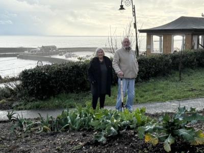 Volunteers Cheryl and Alan Reynolds at the community garden