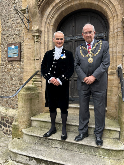 High Sheriff in traditional dress stood on the steps of the Guildhall with mayor of lyme regis