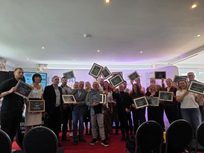 Business representatives with their awards at the ceremony
