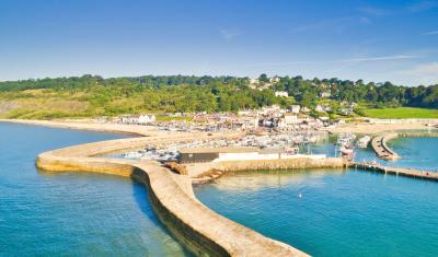 Lyme Regis Cobb wall looking back toward lifeboat station
