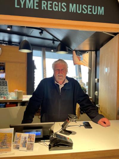 Lyme Regis Museum volunteer, Martin, inside the museum