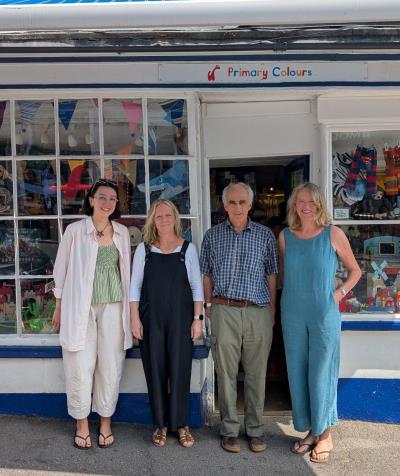 The staff team at Primary Colours outside the shopfront on Broad Street