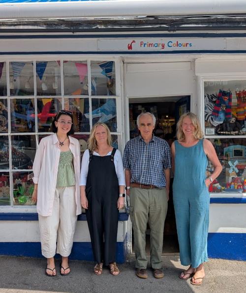 The staff team at Primary Colours outside the shopfront on Broad Street