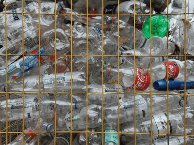 an image of a heap of plastic bottles at a recycling centre