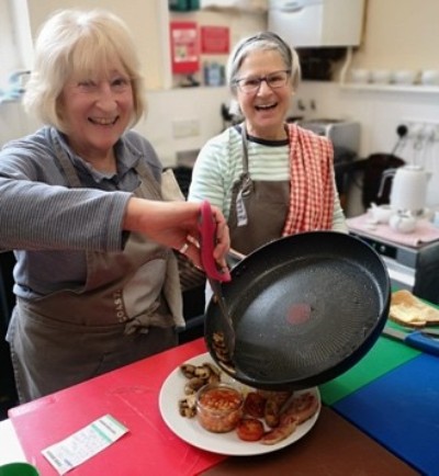 Volunteers at the Old Schoolhouse Cafe serving up a delicious breakfast