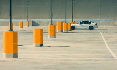 a single car parked in a car park