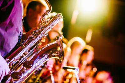 Saxophone under stage lighting
