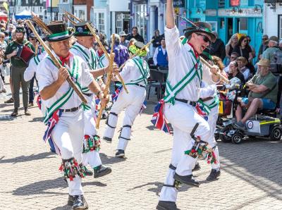 Lyme Morris performing at the wessex festival at weymouth seafront