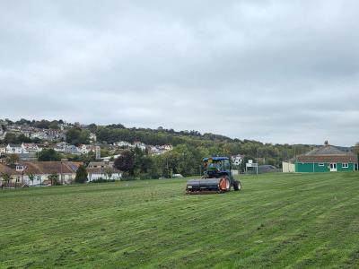 Verti-Draining at Anning Road Playing Field tractor on the field