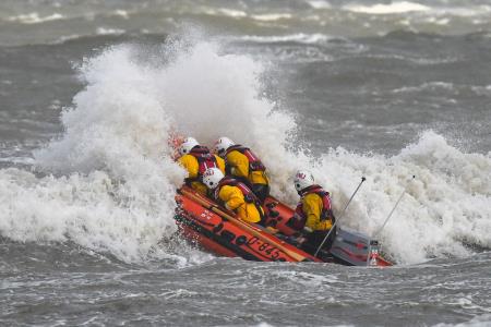 RNLI crews in rough weather