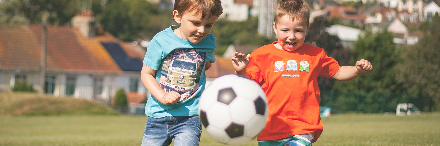 boys playing football