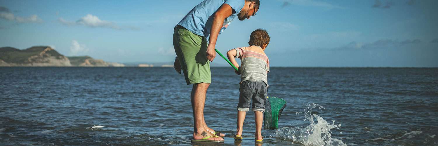 Father and son with net