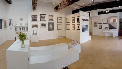 a photograph of the inside of malthouse gallery lyme regis